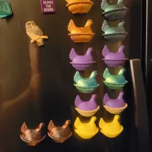hen on nest fridge magnet