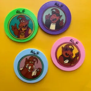 alf volvio en forma de fichas chapa Los simpsons simpson