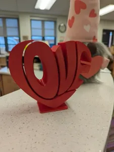 Desktop love sign in the shape of a heart