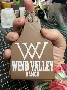 Wind Valley Ranch cow tag key chain