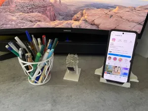 Porte-téléphone, porte-montre et porte-crayon