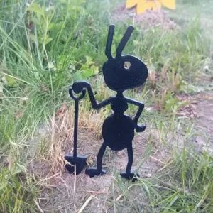 Garden figure of an ant with a shovel
