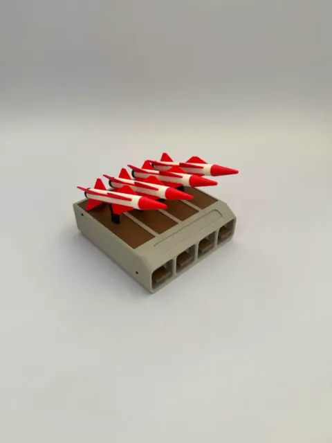 Automatic missile system - battery holder