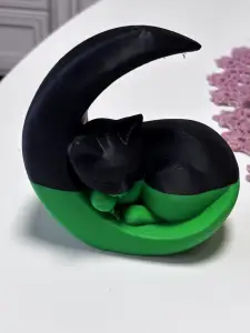 Sleeping cat sculpture