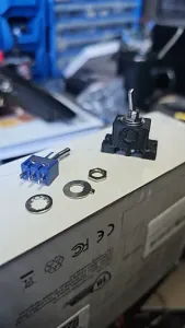 Screw on cover for 6 amp 125 VAC toggle switch.