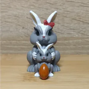 Cute Easter bunny. First egg