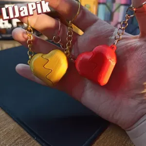 Paired heart-shaped keychains