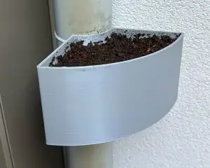 Drainpipe flower/herbs planter