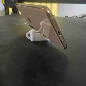 https://cults3d.com/en/3d-model/gadget/foldable-phone-holder