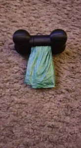 Bone shaped doggy poop bag holder