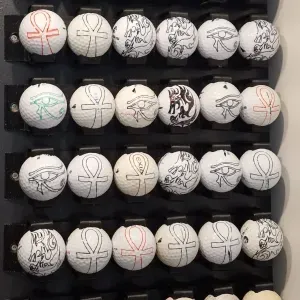 Quick-Release Golf Ball Wall Holder