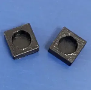 Spacer (wedge) for coffee machine brewing unit