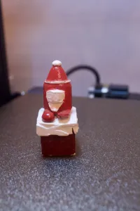 Amongus Santa on a Chimney