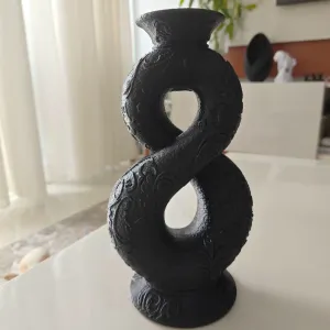 Fantasy like vase, in the form of 8 or infinite
