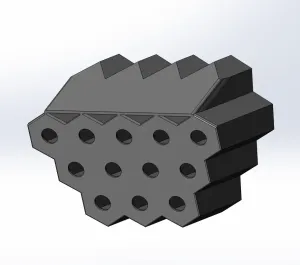 A pen holder in the shape of a honeycomb.