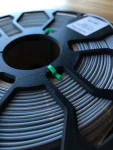 Tapa y seguro carrete ecofila Hellbot