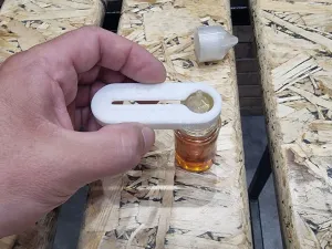 E-liquid bottle opener