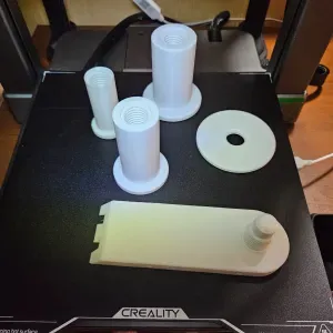 Interchangeable rear spool holder for CFS Hi overhead