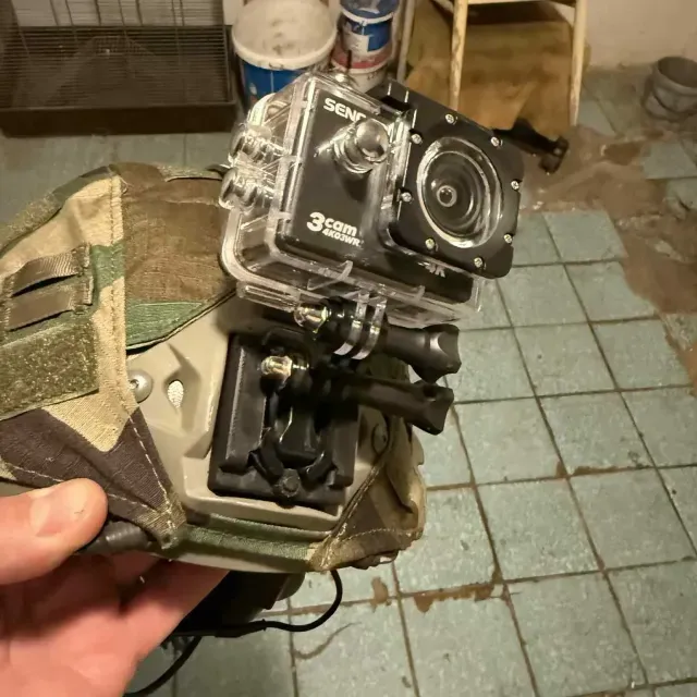 Action camera mount for FAST/FMA/MICH helmets