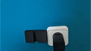 Phone charging box with a cable cutout