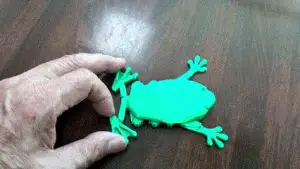 Frog with moving arms and extending legs