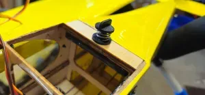 Wing retainer clip for radio controlled model aeroplanes.