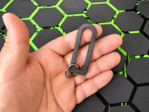 Removable shopping cart coin with seat belt plug