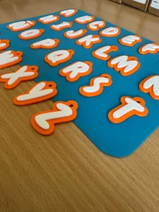 27 LETTER KEYCHAINS — A-Z + Ñ