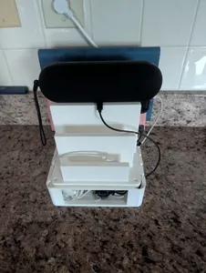 Phone charging station with storage