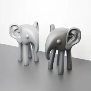 elephant sculphture with human ears