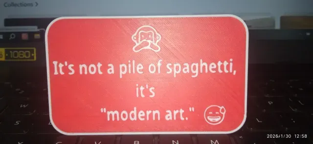 It's not a pile of spaghetti, it's modern art- Sign