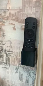 Stand for TV remote control with hidden self-tapping screws.