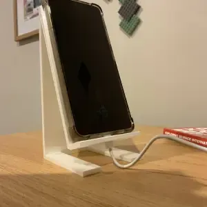 Phone stand w charger at bottom