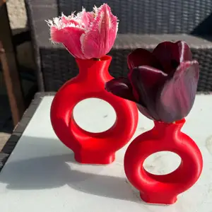 A vase, a flower pot with a futuristic look