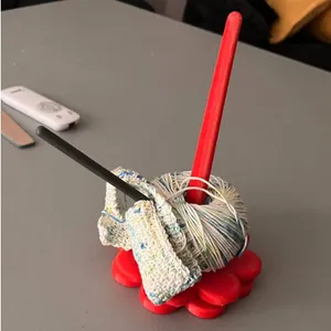 Yarn holder spinner flower