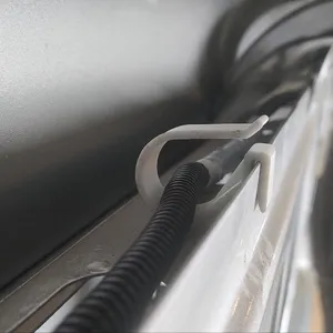 A clip for attaching wiring to a Ford transit van